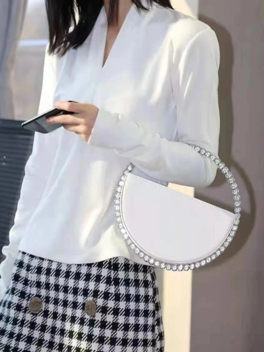 Circular Patent Leather Handbag